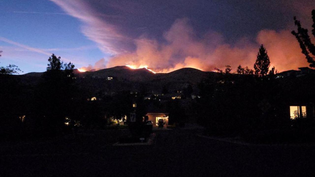 Fast-moving wildfire forces thousands to evacuate near Reno, Nevada