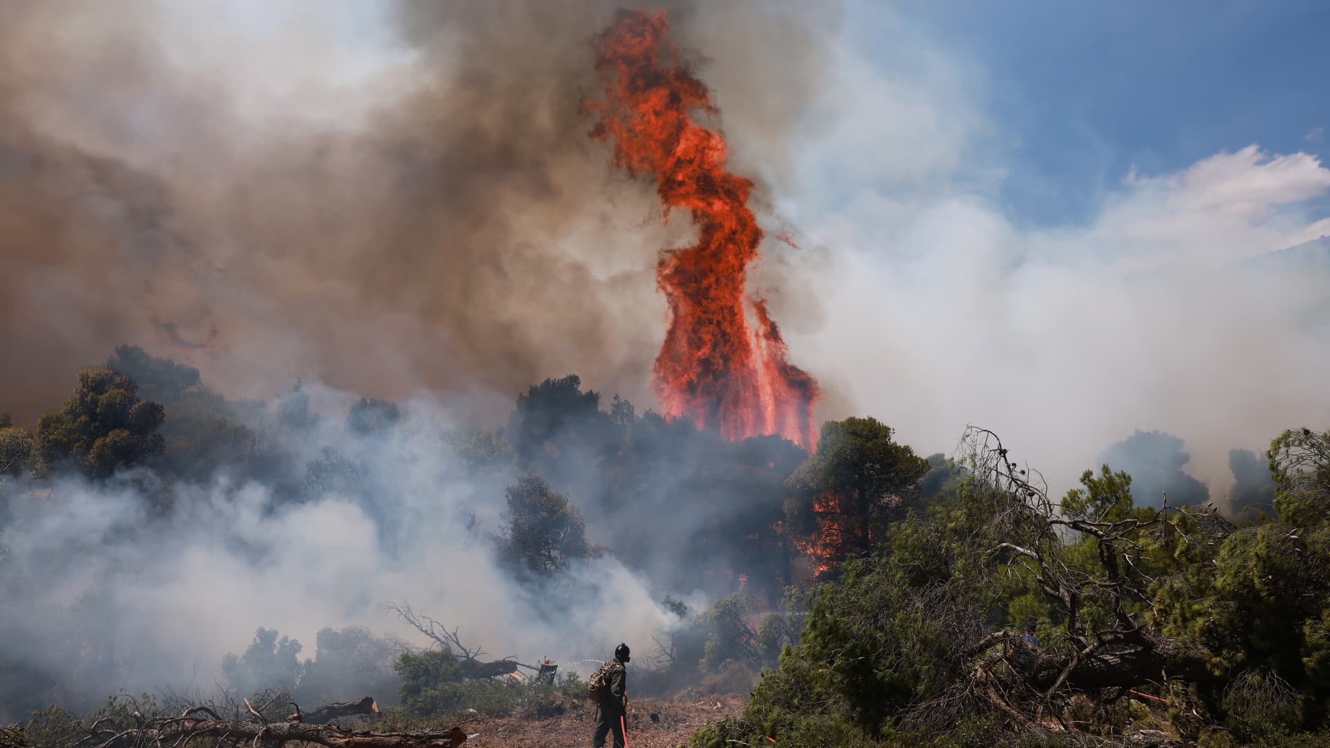 Two die as firefighting helicopters collide in Greece; French blaze changes course